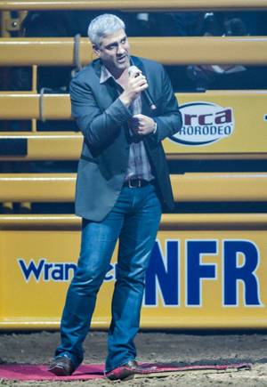 Taylor Hicks sings the national anthem at Day 1 of the 2012 Wrangler National Finals Rodeo at the Thomas & Mack Center on Thursday, Dec. 6, 2012.